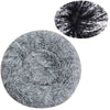 A circular image showing a close-up of ultra-soft plush pet beds for dogs and cats.