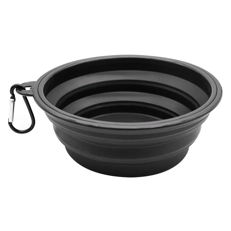 Black portable silicone pet feeder bowl with a carabiner clip