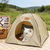 Tente lit ombrage beige respirante pour animaux avec entrée arquée, montrant un chat blanc à l'intérieur.