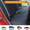 A dark gray waterproof dog car seat cover with side flaps and a safety strap installed in a vehicle interior.