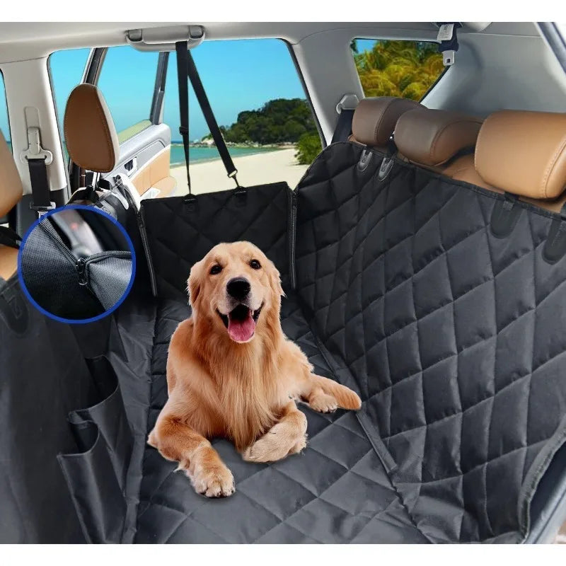 Un golden retriever relajándose en una funda para asiento de coche impermeable y protector de hamaca dentro de un vehículo.