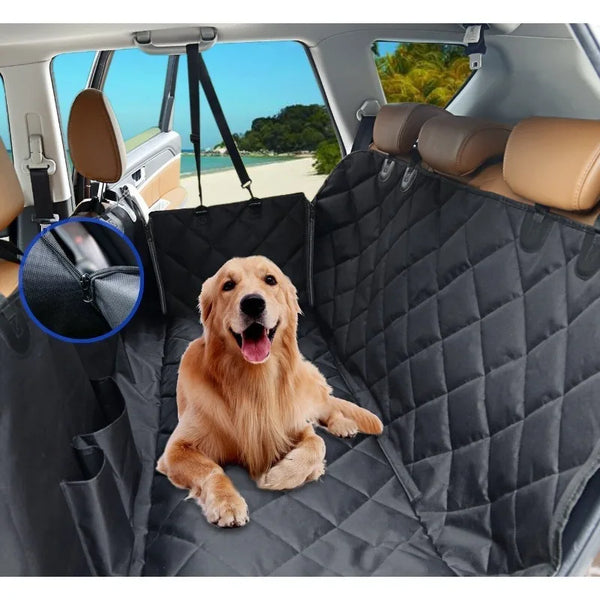 A golden retriever dog is relaxing on a black waterproof car seat cover and hammock protector inside a vehicle.