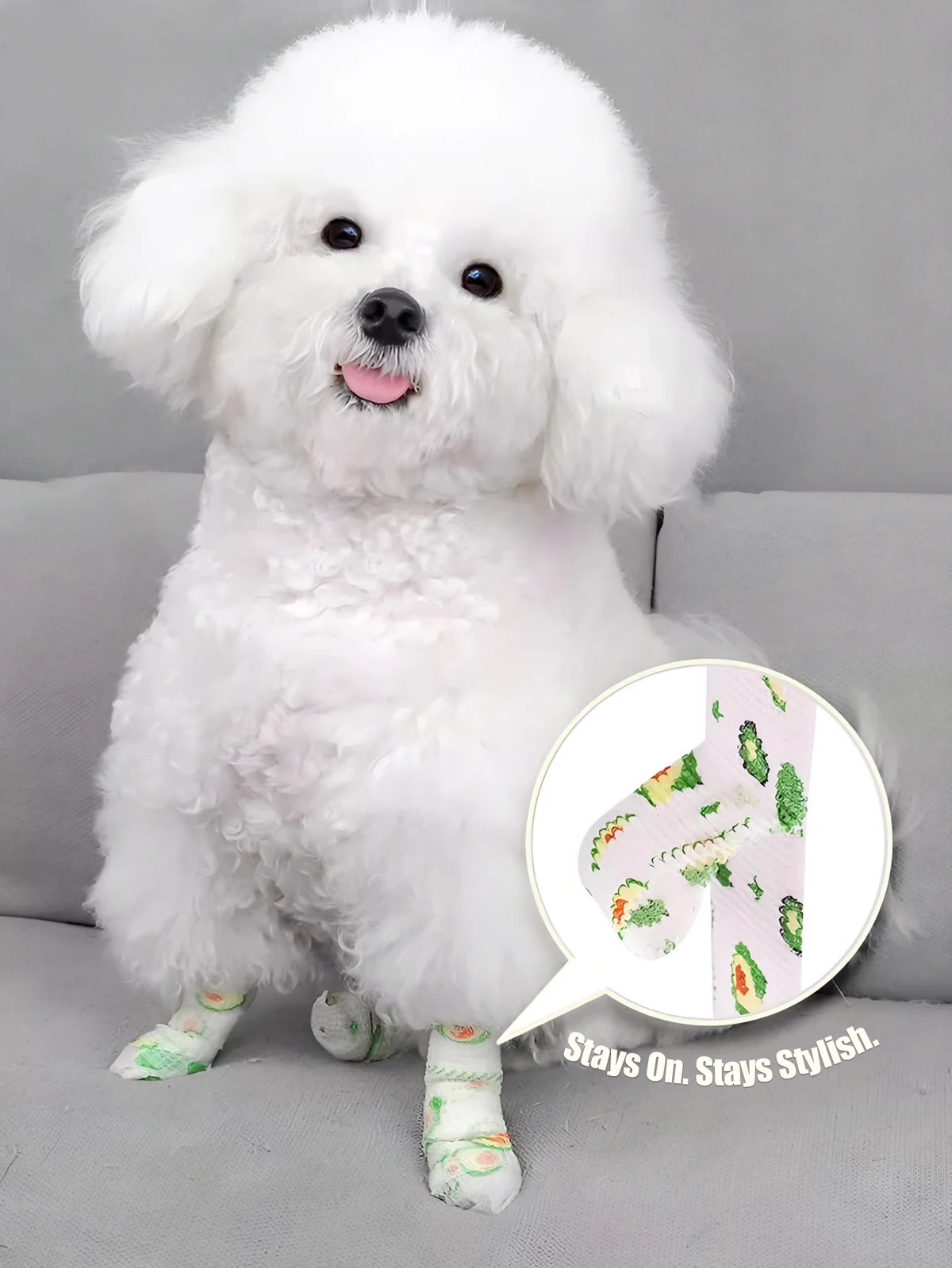 A fluffy white dog wearing a self-adhesive paw protector bandage on its front leg.