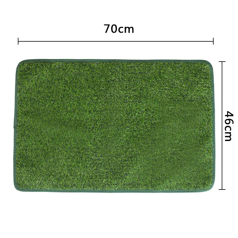A rectangular green dog grass mat measuring 70cm by 46cm.