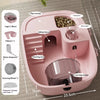 A pink luxury hamster habitat cage showing various accessories like a play runway, hiding house, feeding area, and water feed