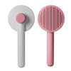 A white and pink pet hair removal brush for cats and dogs shown from the side.