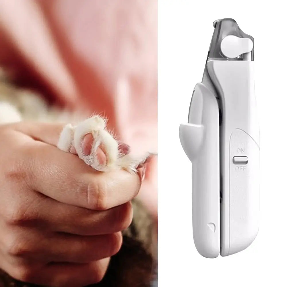 A white professional LED pet nail clipper is shown next to a hand, demonstrating its size and design.