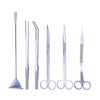 A set of stainless steel aquarium cleaning tools including a skimmer and various cleaning implements.