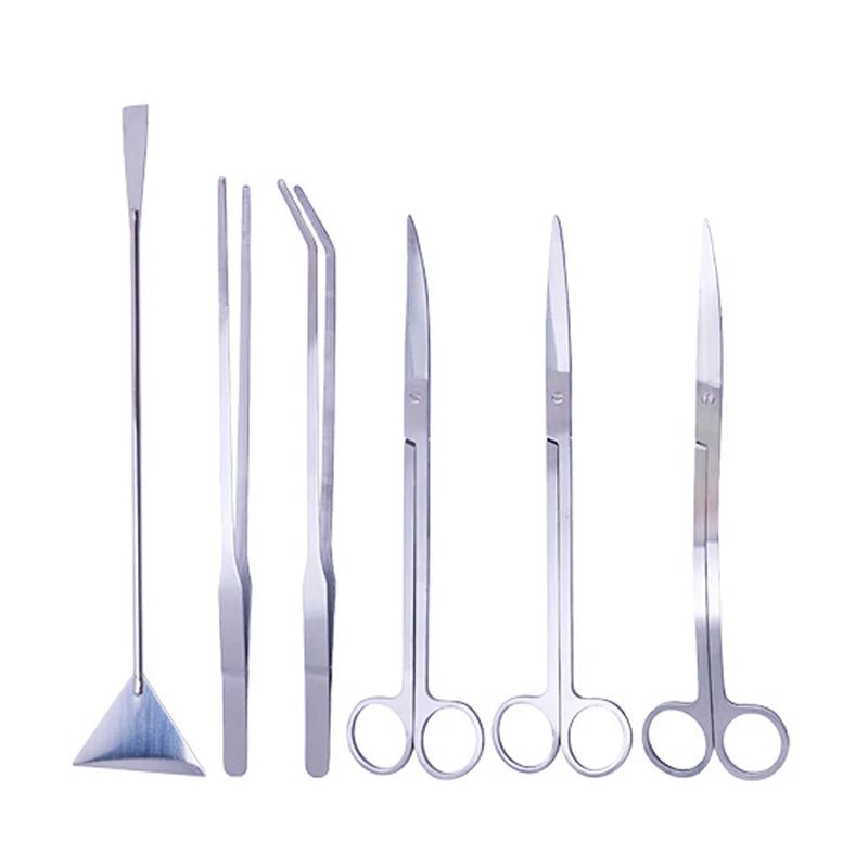 A set of stainless steel aquarium cleaning tools including a skimmer and various cleaning implements.