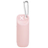 A pink silicone dog poop bag dispenser with a silver clip and an 'X' marking.