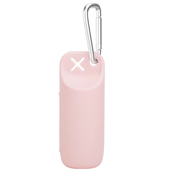 A pink silicone dog poop bag dispenser with a silver clip and an 'X' marking.
