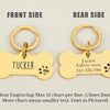 Front and rear views of a gold-colored bone-shaped stainless steel dog ID tag engraved with the name Tucker