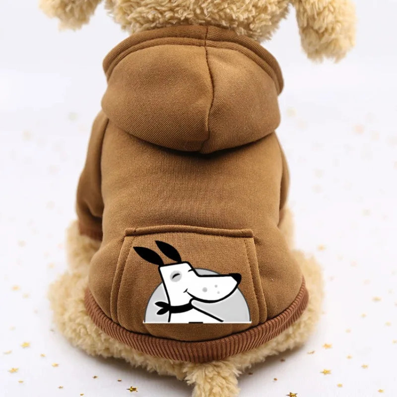 A brown fleece dog sweatshirt with a hood and a patch featuring a cartoon rabbit face.