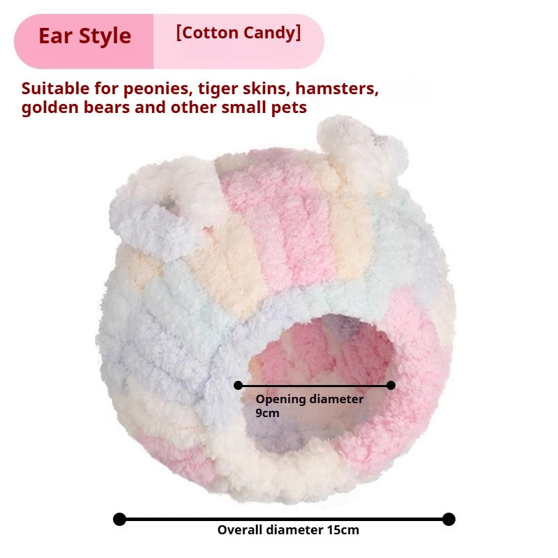Flauschiges rosa und weißes Flanellvogernest mit einem Öffnungsdurchmesser von 9 cm und einem Gesamtdurchmesser von 15 cm