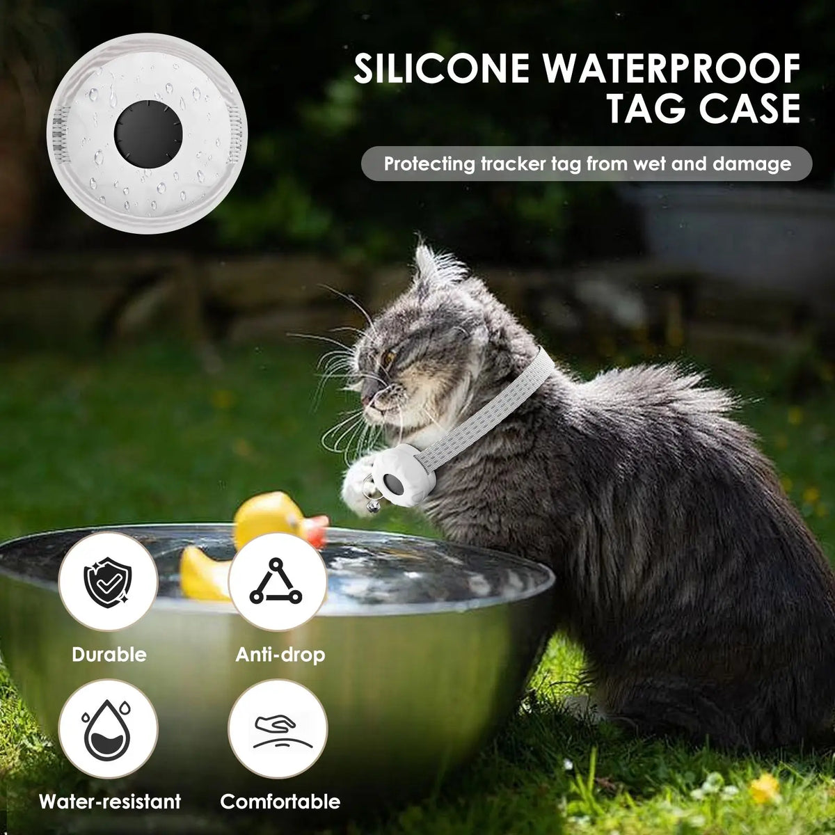 A gray cat wearing a silicone waterproof tag case on its collar near a bowl outdoors.