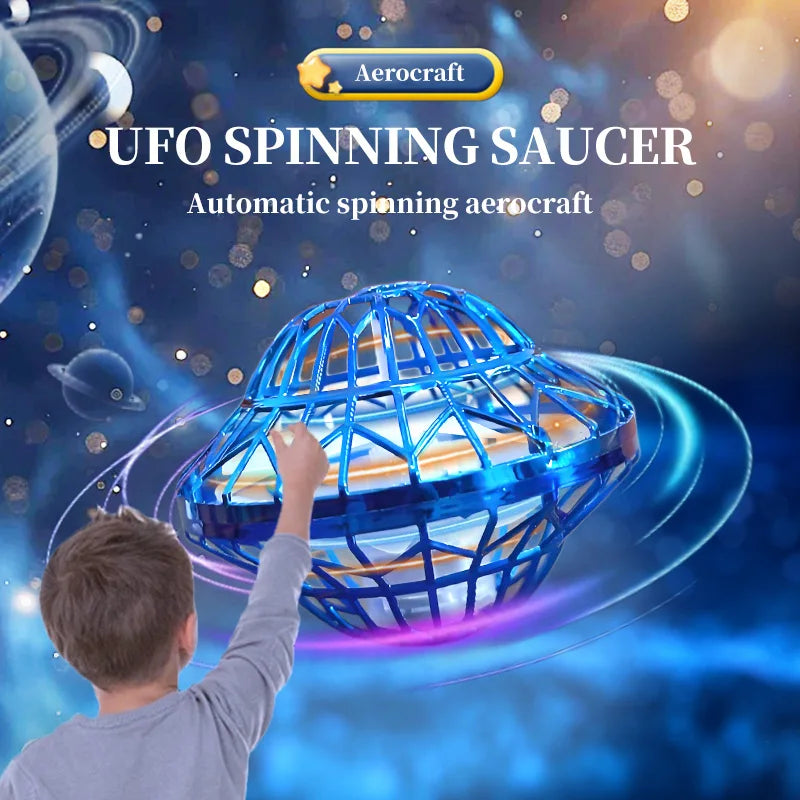 A boy is holding a blue UFO spinning saucer toy in mid-air against a dark blue background.