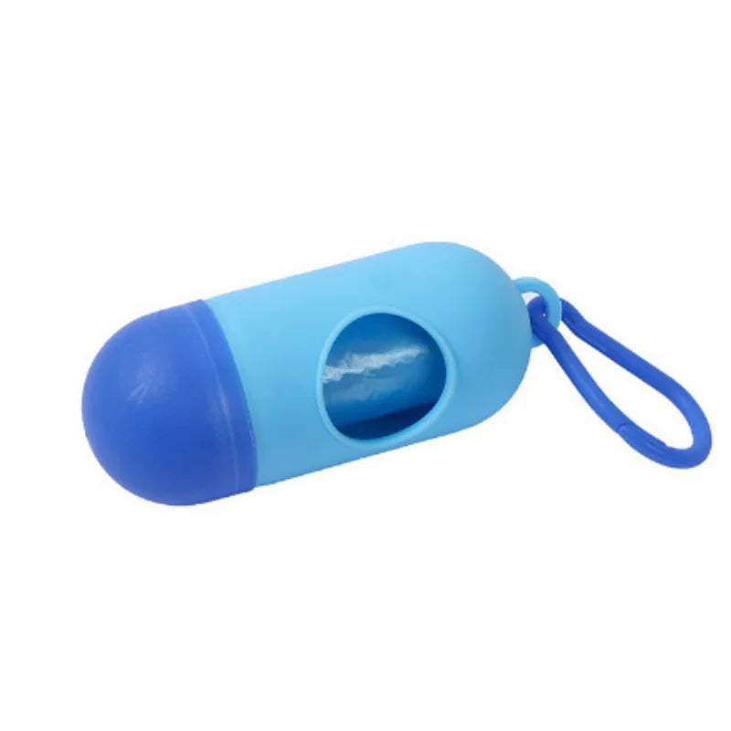 Blue capsule-shaped dog poop bag dispenser with a carabiner clip.
