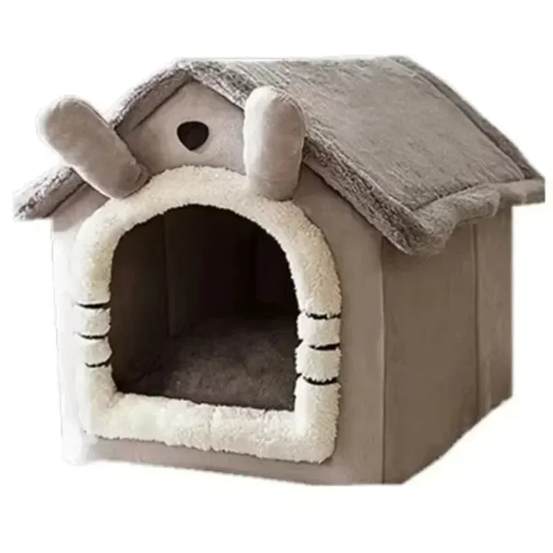 A light gray pet house with a pitched roof and ears, designed as a detachable and washable dog bed.