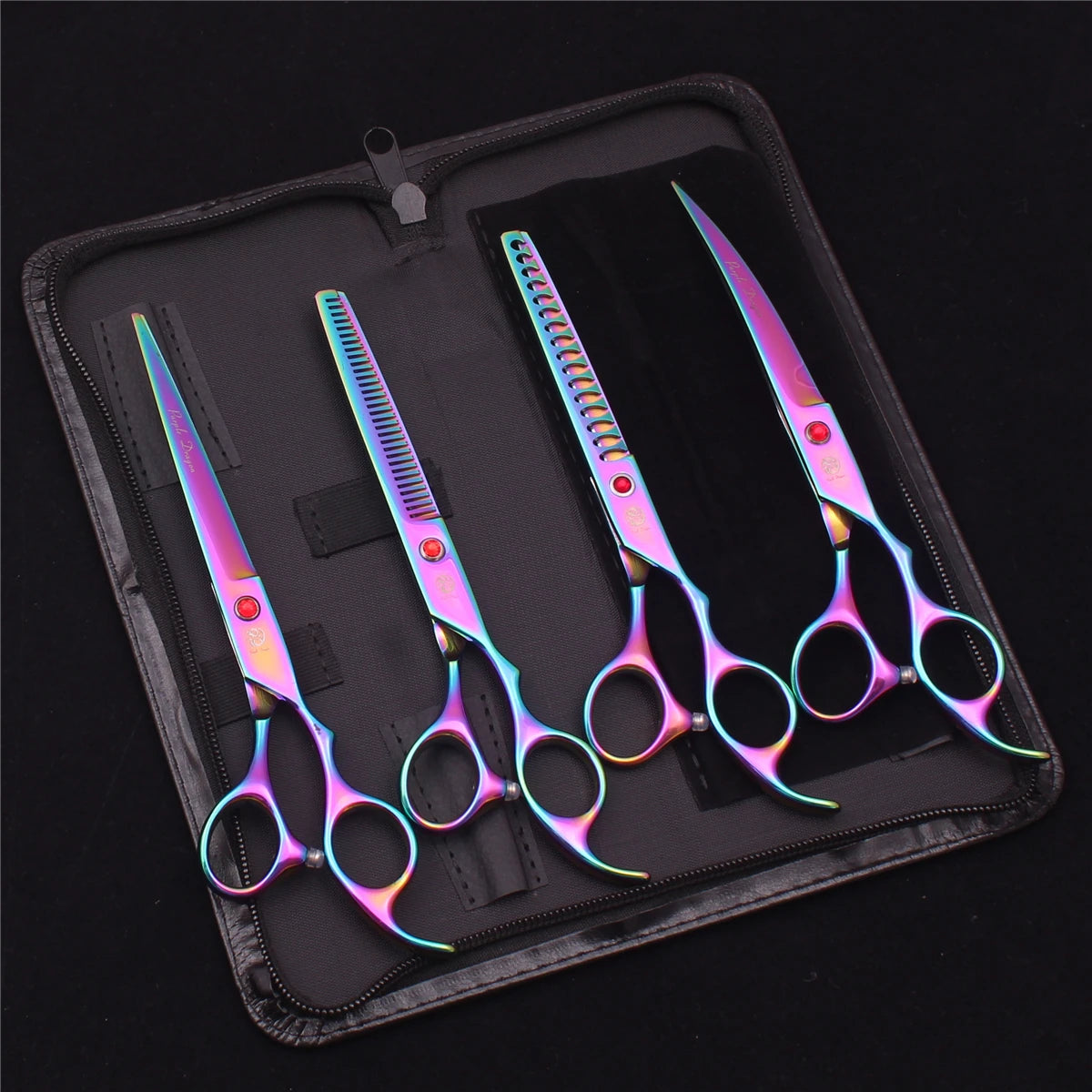 A set of professional stainless steel pet grooming scissors displayed in a black zippered case.