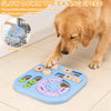 A golden retriever is interacting with a blue puzzle feeder toy designed to slow down meal times and promote digestion.