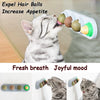 A tabby cat is licking edible hair balls for appetite and fresh breath.