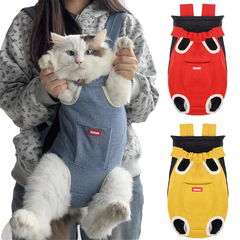 A fluffy white and brown cat is being held in a red cycling walking pet carrier for cats.