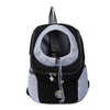 A black and gray portable pet carrier backpack with a mesh window and carrying strap.