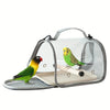 A portable bird travel carrier with a transparent viewing panel, showing a small green and yellow bird inside.