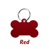 A red bone-shaped dog ID tag with a metal loop.