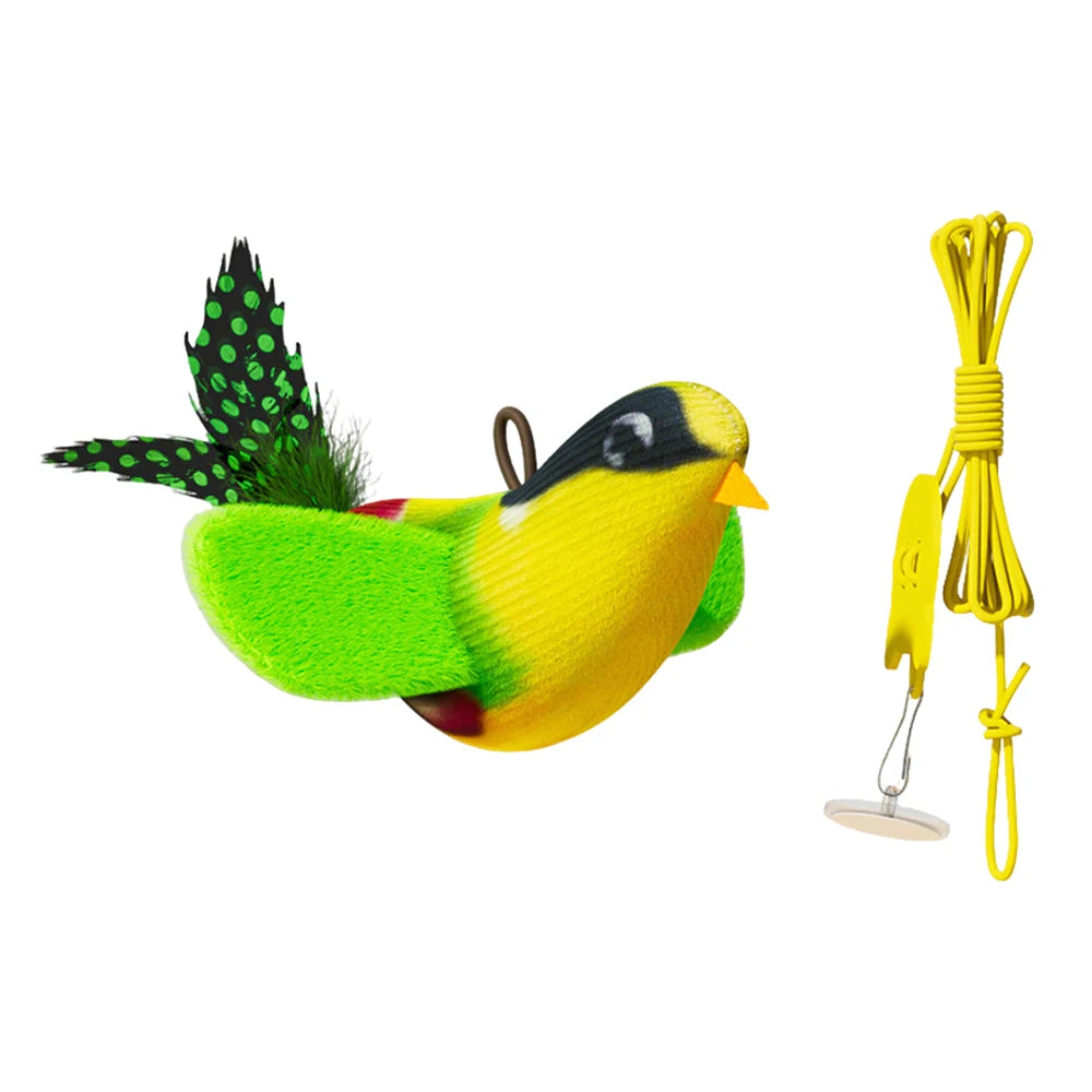 A yellow and green interactive automatic rolling cat toy with a black face and green spiky feathers, attached to a yellow str