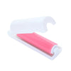 A white reusable washable lint roller with a pink roll inside.