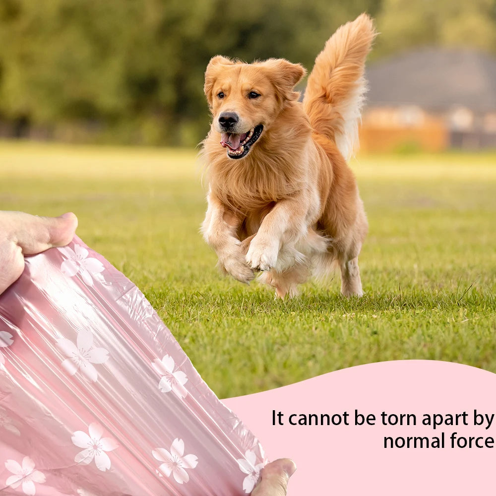 A golden retriever dog is running in a grassy field next to a pink biodegradable poop bag.