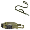 Olive green tactical dog GPS collar with an attached AirTag holder and strap.
