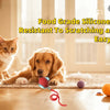 A golden retriever and a tabby cat are interacting with a silicone cat toy on a wooden floor.
