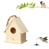 A light wooden birdhouse with a circular entrance hole is shown next to a small bird perched on a branch.