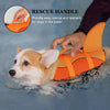 An orange dog life jacket is being used to rescue a small dog in the water.