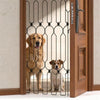 A brown dog is visible through an adjustable metal pet safety gate installed in a wooden door frame.