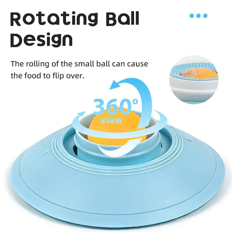 Drehbare Ball-Matte zum Essen in Hellblau und Gelb, die zeigt, wie der rollende Ball Essen umkippt.