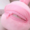A soft pink interactive pet shake and jump ball toy with a zipper visible on the top.