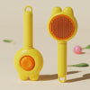 A yellow pet deshedding brush for cats and dogs with a self-cleaning design shown against a light background.