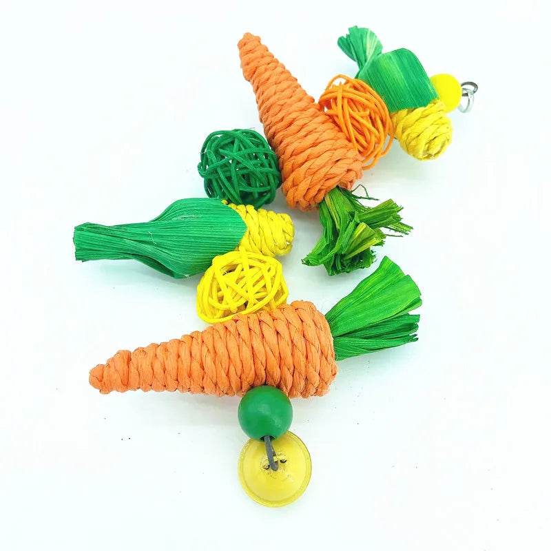 Handwoven natural vine bird and pet swing toy featuring orange and green yarn components.
