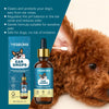 A bottle of YEGBON Ear Drops next to a brown dog's ear, showing the product and its intended use for pet ears.