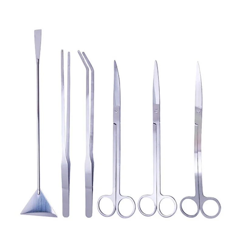 A set of stainless steel aquarium cleaning tools including a skimmer and various cleaning implements.