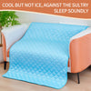A light blue quilted cooling mat is placed on a white sofa, designed to soothe sleep.
