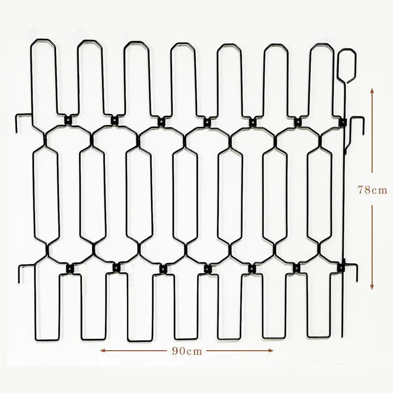 A black adjustable metal pet safety gate with a grid pattern for indoor and outdoor use.