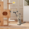 A gray cat interacts with an automatic lifting toy ball that is suspended from a wooden structure.