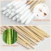 A set of premium cotton swabs and natural bamboo sticks for pet ear cleaning.