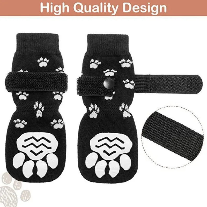 Black anti-slip dog socks with white paw prints and traction straps