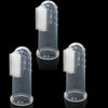 A clear silicone finger toothbrush for dogs with bristles and a base, shown in multiple views.