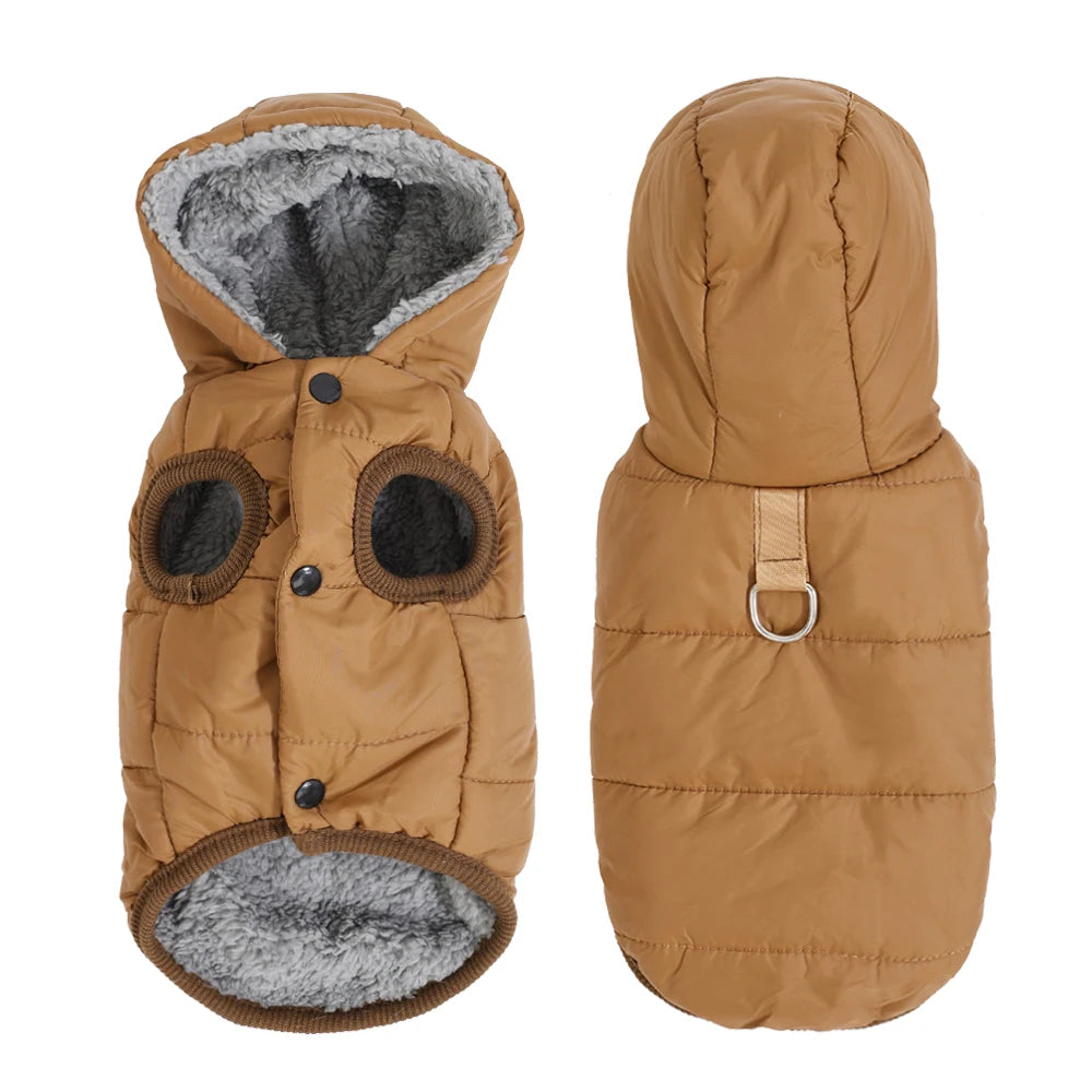 A tan, quilted dog jacket with a gray faux fur lining and a hood.